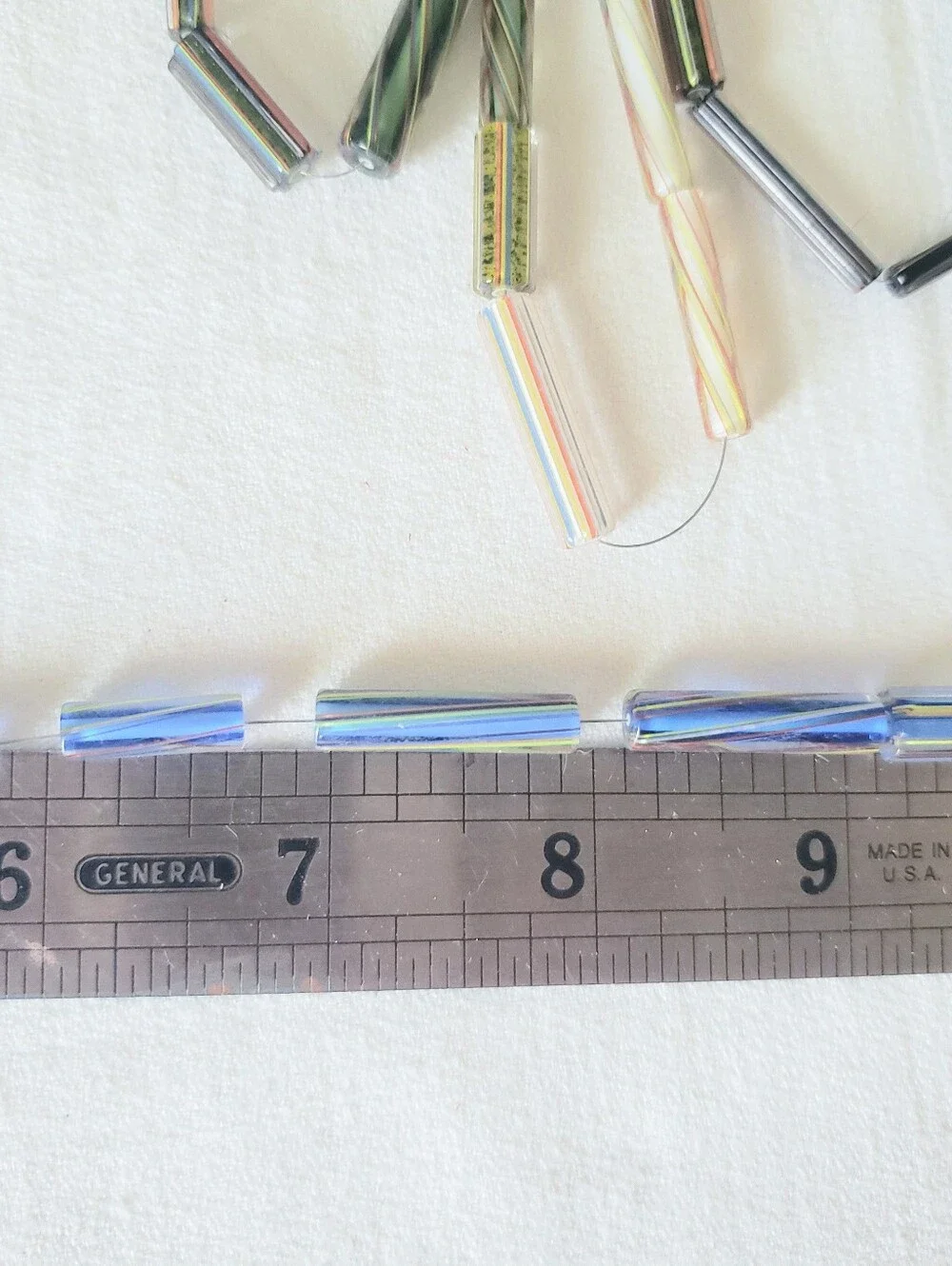 80 hand-drawn glass tube beads
